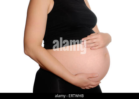 Körper der schwangeren Frau in schwarzer Kleidung Stockfoto