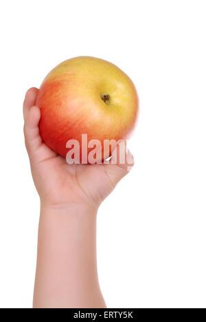 Der Kinder Hand hält einen Apfel, isoliert Stockfoto