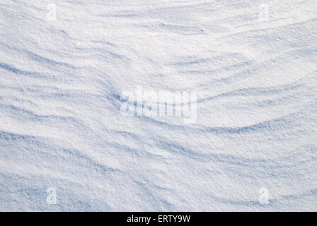 Hintergrund von Schnee glänzte mit der Sonne Stockfoto