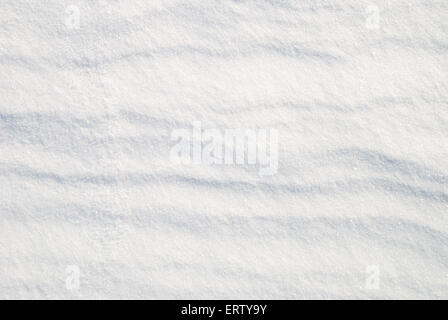 Hintergrund von Schnee glänzte mit der Sonne Stockfoto