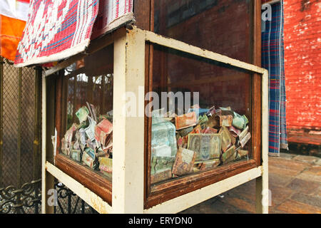 Spendenbox; Gautam Buddha Geburtsort, UNESCO Weltkulturerbe, Lumbini; Nepal, Asien Stockfoto