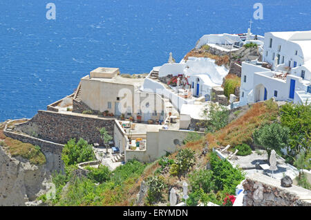 Häuser in Seite der Klippe, Oia, Santorini Stockfoto