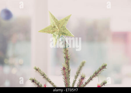 Golden star Christmas Tree topper Stockfoto