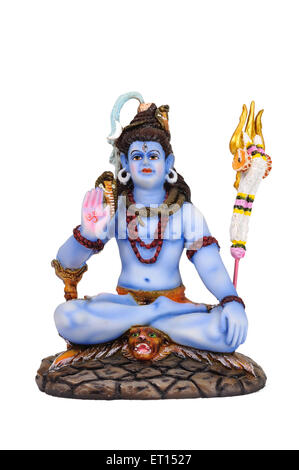 Clay Statue des Gottes Shiva auf Tigerfell sitzend Stockfoto