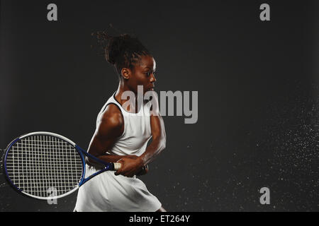 Tennisspielerin, Rückhand Schuss Stockfoto