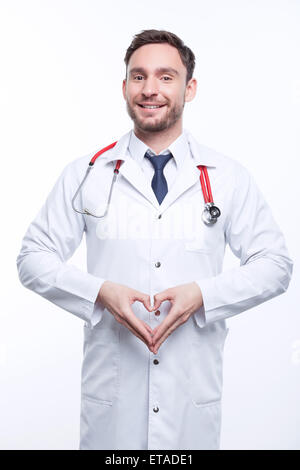 Arzt zeigt Liebe Lächeln Stockfoto