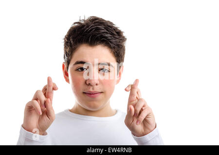 Lateinische junge mit Akne in eine weiße Langarm T-shirt lächelt Daumen beider Hände als abergläubische Geste um Glück zu erhalten Stockfoto