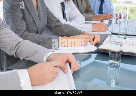 Business-Team Notizen während der Konferenz Stockfoto