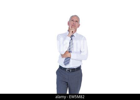 Ernst Kaufmann denken mit Hand am Kinn Stockfoto