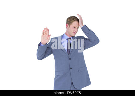 Gestressten Geschäftsmann bekommen Kopfschmerzen Stockfoto