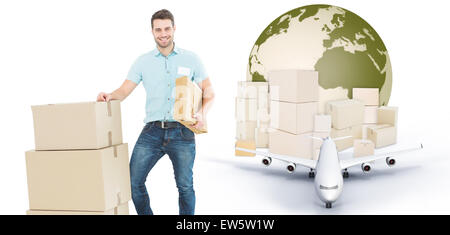 Zusammengesetztes Bild der Kurier Mann mit Kartons Stockfoto