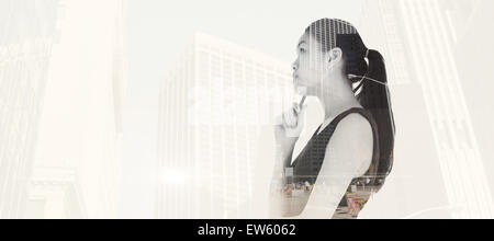 Zusammengesetztes Bild des nachdenklichen asiatische Geschäftsfrau Stockfoto