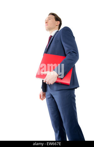 Nachdenklich Geschäftsmann Betrieb rote Ordner Stockfoto