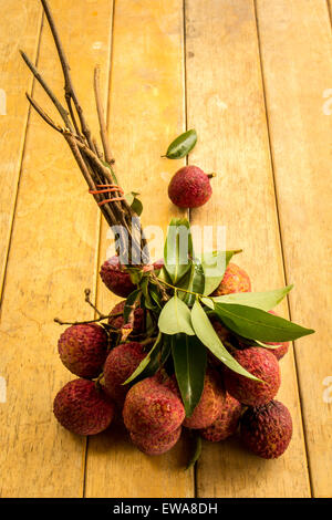 Litschi, rot, Bodenplatten, Bodenbelag, Hintergrund, Textur, Obst. Stockfoto