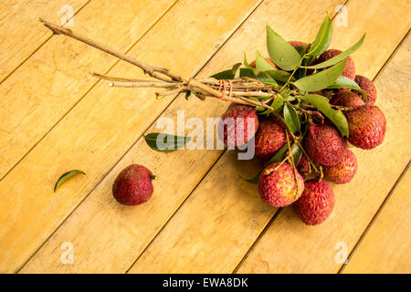 Litschi, rot, Bodenplatten, Bodenbelag, Hintergrund, Textur, Obst. Stockfoto