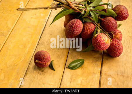 Litschi, rot, Bodenplatten, Bodenbelag, Hintergrund, Textur, Obst. Stockfoto