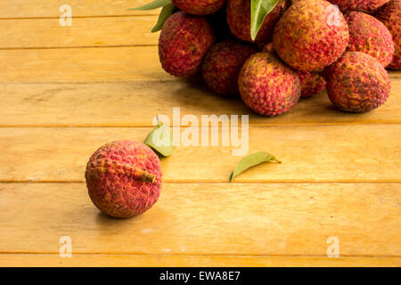 Litschi, rot, Bodenplatten, Bodenbelag, Hintergrund, Textur, Obst. Stockfoto