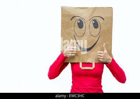 Glückliche Frau hält Daumen hoch isoliert auf weißem Hintergrund Stockfoto