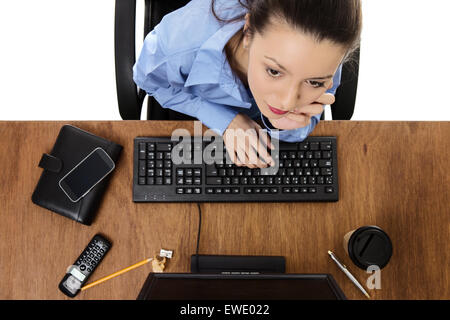 Frau arbeitet an Ihrem Schreibtisch Schuss aus Vogelperspektive Stockfoto