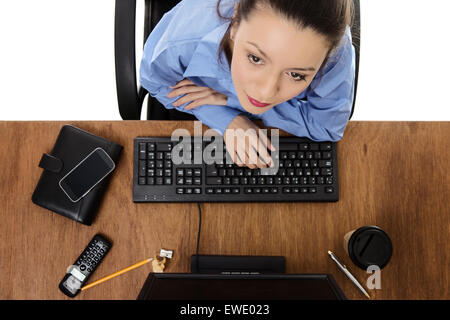 Frau arbeitet an Ihrem Schreibtisch Schuss aus Vogelperspektive Stockfoto