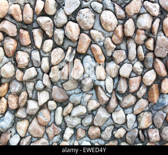 Alte Mauer aus Steinen und Mörtel. Kann als Hintergrund verwendet werden Stockfoto