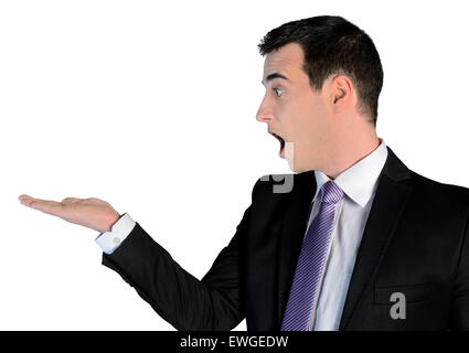 Isolierte Geschäftsmann überrascht mit leere Handfläche Stockfoto