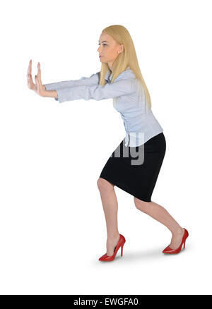 Isolierte Geschäftsfrau drücken Sie etwas Stockfoto