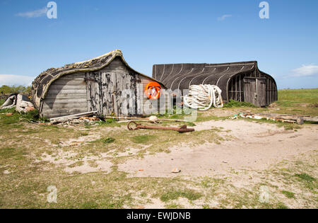 Umgedrehten Boote als Speicher verwendet vergossen, heilige Insel Lindisfarne, Northumberland, England, UK Stockfoto