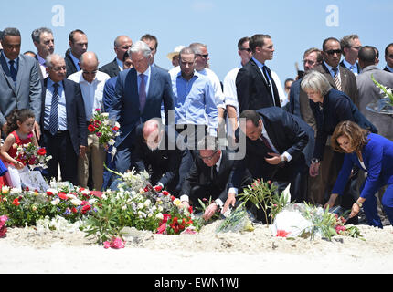 Sousse, Strafjustiz. 29. Juni 2015. Hotelbesitzer Zohra Driss (R-l) British Home Secretary Theresa May, tunesischen Innenminister Mohamed Najem Gharsalli, Bundesminister des Innern Thomas de Maiziere und französische Minister des Innern Bernard Cazeneuve besuchen die Szene des Schießens der das Hotel Imperial Marhaba in Sousse, Strafjustiz, 29. Juni 2015. Mindestens 38 Menschen starben in den Terroranschlag in Tunesien, vor allem Urlauber. Bildnachweis: Dpa picture Alliance/Alamy Live News Stockfoto