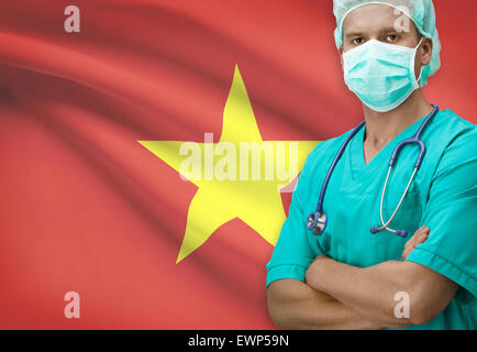 Chirurg mit Flagge auf Hintergrund - Vietnam Stockfoto