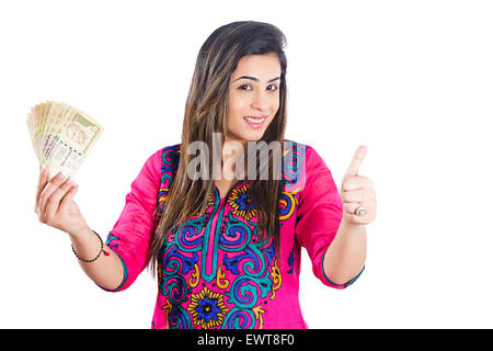 1 indische Frau Hausfrau Thumbs Up Anzeigen Geld Stockfoto