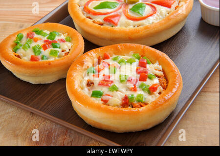 Pizza in verschiedenen Größen Stockfoto