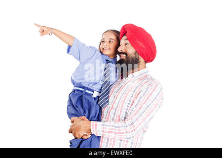 2 indische Punjabi Vater und Schüler Tochter Schuldzuweisungen Stockfoto