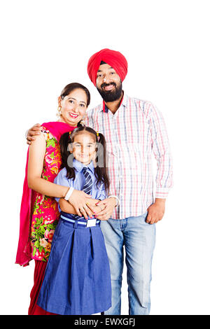 Indian Punjabi Eltern und Schüler Tochter Pflege Stockfoto