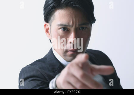 Wütend japanischer Geschäftsmann Stockfoto
