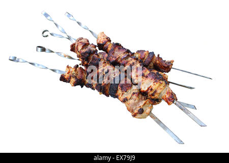Kebab. Gegrilltes Fleisch am Spieß isoliert auf weißem Hintergrund. Stockfoto