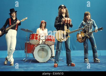 SLADE UK-pop-Gruppe im Jahre 1974. Von links: Jim Lea, Don Powell, Noddy Holder, Dave Hill Stockfoto