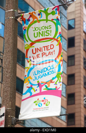 2015 Spiele PanAm Banner mit "United spielen wir" Motto in drei verschiedenen Sprachen (TORONTO, Kanada) Stockfoto