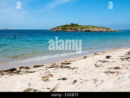 Pelistry Bay Beach und Maut Insel, St. Marien, Isles of Scilly, Cornwall, England. Stockfoto