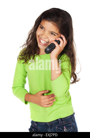 Ziemlich niedlich kaukasische Mädchen trägt ein grünes Langarm-Top und blaue Jeans. Sie spricht auf dem Handy. Stockfoto