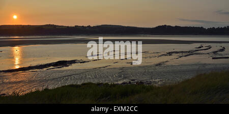 Sonnenuntergang am Fluss Severn bei Ebbe, Purton, Gloucestershire Stockfoto