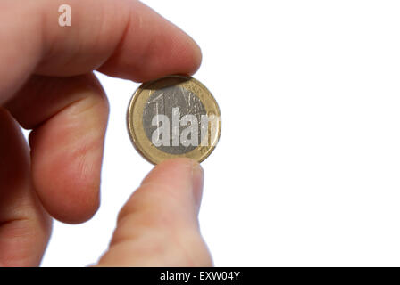 Hand am Euro, 1 € Stockfoto