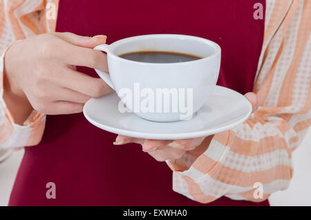 Junge Frau mit einer Tasse Kaffee, Stockfoto