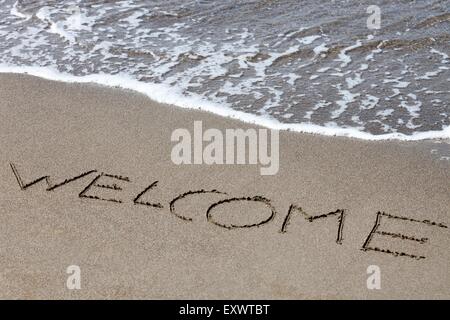 Willkommen gemalt in Sand, Italien, Europa Stockfoto