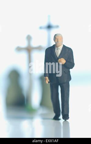 Miniatur-Figur auf einer Beerdigung Stockfoto