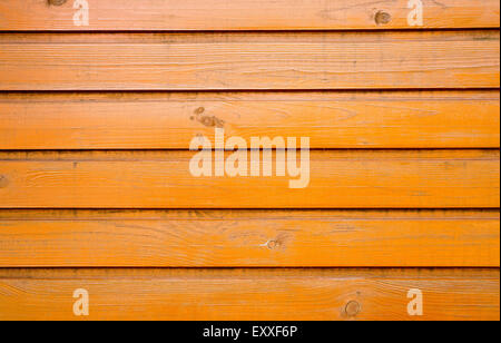 Alte hölzerne Hintergrund Orange lackiert Stockfoto