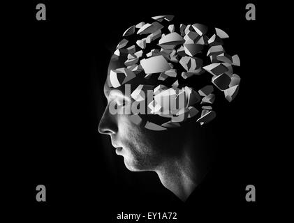 Männliche Kopfprofil mit 3d Explosion Gehirn Fragmente auf schwarzem Hintergrund Stockfoto