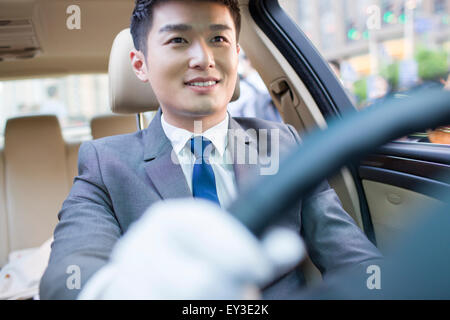 Chauffeur, Auto zu fahren Stockfoto