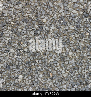 Fonds besteht aus Kies mit Farben grau, blau und Sand. Stockfoto