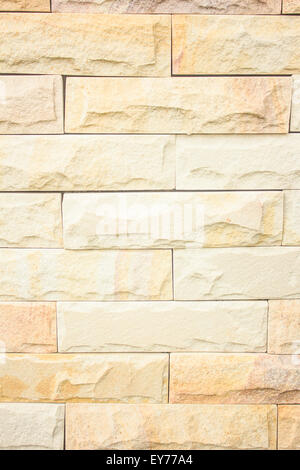 cremefarbene Ziegel Wand Textur Stockfoto